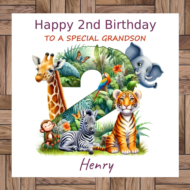 Op de afbeelding: Een witte kaart met een jungle-thema illustratie van het nummer 2. Het nummer is omringd door dieren, waaronder een giraffe, zebra, tijger, aap en olifant. De tekst "Happy 2nd Birthday to a Special Grandson" staat bovenaan de kaart en de naam "Henry" staat onderaan.