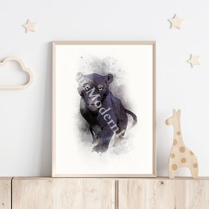 May include: A black panther with yellow eyes is depicted in a watercolor style against a white background. The panther is looking directly at the viewer with a serious expression. The image is framed in a light brown frame.
