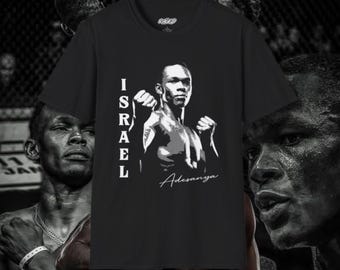 May include: Black t-shirt with a white graphic of a mixed martial arts fighter, Israel Adesanya, in a fighting pose. The text "ISRAEL Adesanya" is printed in white below the graphic.