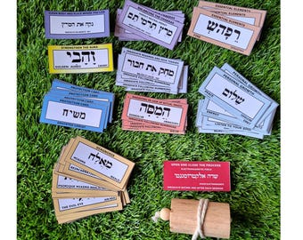 Hebrew Beech Pendulum with 70 Color Labels for Cleansing, Healing, and Other Therapies with a Sachet. In Spanish, English, French, and Italian.