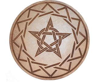 May include: A wooden coaster with a pentagram design. The pentagram is surrounded by a circle of triangles.