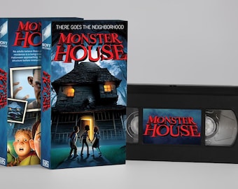 May include: A VHS tape and two movie cases for the animated film "Monster House." The cases feature the movie title in red, with images of a spooky house and children. The VHS tape is black with the movie title on the label.