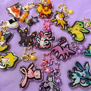 Pokémon/Eeveelution w/ Japanese Snacks Double Sided Keychains// 2in. Keychains All 9 Eeveelution!!!