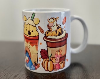 ティガーがイーヨーを抱きしめるくまのプーさんの T シャツ