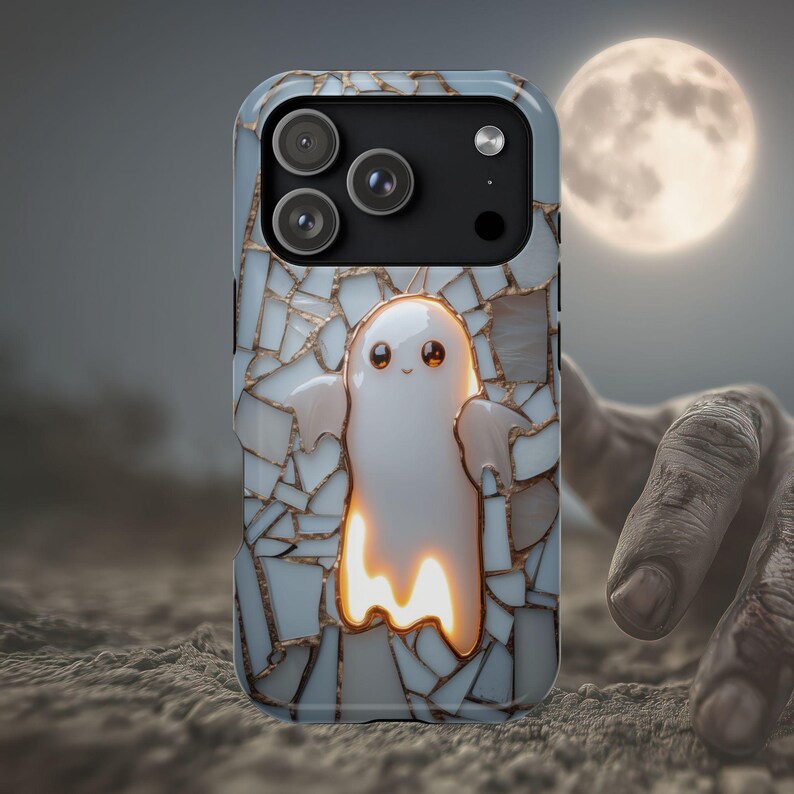 May include: A smartphone case featuring a central glowing white ghost character against a background of light blue and white mosaic tiles with gold-colored grout lines. The case has a black camera module with three circular lenses and a flash.