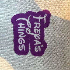 May include: Purple sticker with white text that reads "Freya's Things"
