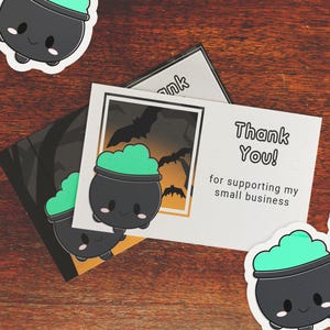 A closeup photo of the printed Cauldron thank you cards ~3.5&quo" x 2".