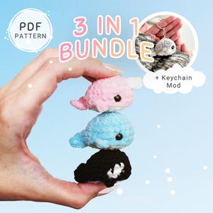 May include: A hand holds three crocheted whale figurines in pink, blue, and black. The whales have black eyes and small fins. The image includes text that says "3 in 1 BUNDLE" and "PDF PATTERN". A smaller image shows a whale keychain.