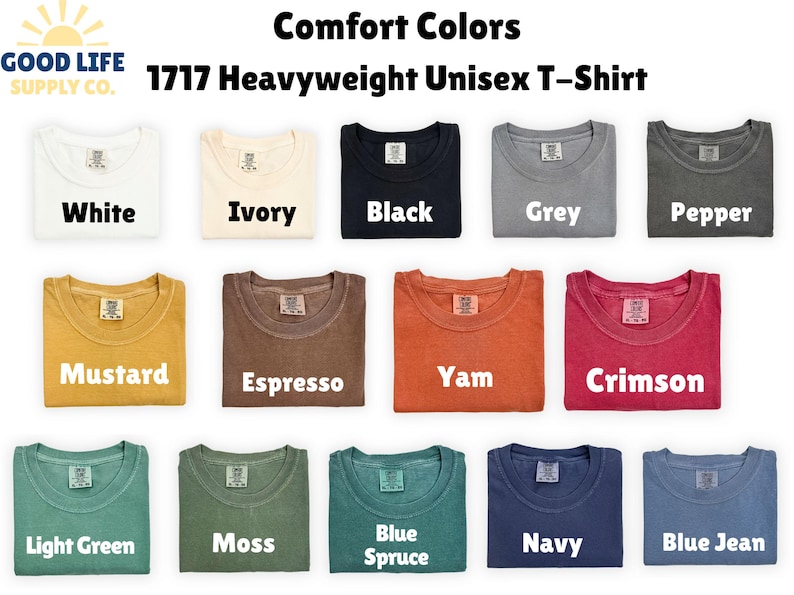 May include: A display of folded Comfort Colors 1717 Heavyweight Unisex T-shirts in various colors, including white, ivory, black, grey, pepper, mustard, espresso, yam, crimson, light green, moss, blue spruce, navy, and blue jean.