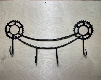 Recycled cog coat rack- black