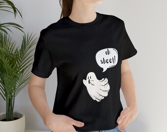 May include: Black t-shirt with a white ghost graphic and the text "oh sheet!" in a speech bubble.