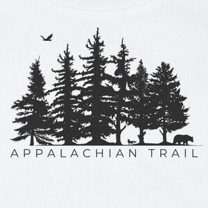 May include: Black and white silhouette graphic of a forest with a bird flying overhead, a bear, and a deer walking through the trees. The text "Appalachian Trail" is below the image.