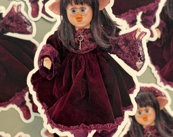 Furby Oddbody Faeby Doll in a Purple Dress Sticker
