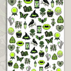 May include: A sticker sheet featuring various gothic-themed illustrations in shades of neon green, black, and white. Designs include skulls, ravens, hourglasses, crystal balls, skeleton hands, bats, butterflies, roses, lips, and spider webs.