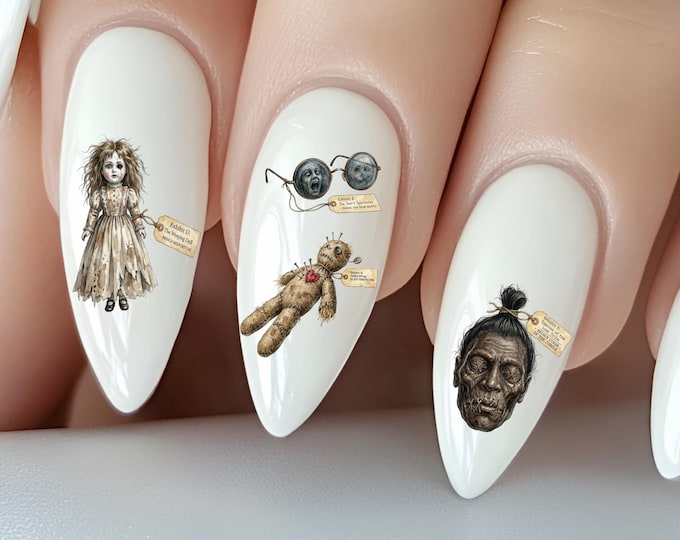 Occult artifacts, water-slide nail stickers, cursed, dark fantasy, voodoo doll, cursed doll