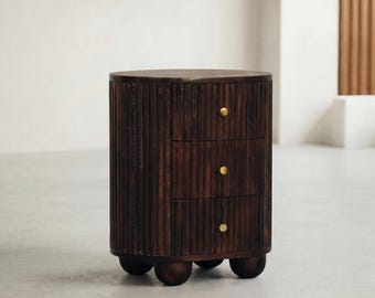 Round fluted nightstand with drawers, dark wood circular bedside table with gold handles, modern wooden side table