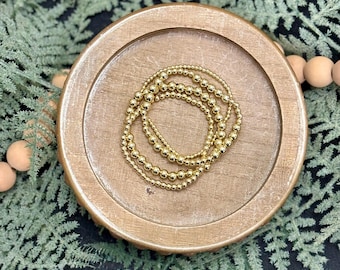 Ensemble de bracelets en perles d'or 14 carats