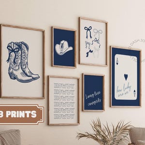 May include: Set of eight blue and white prints with western themes. The prints feature cowboy boots, a cowboy hat, a playing card, and the words "Howdy" and "Long live cowgirls".