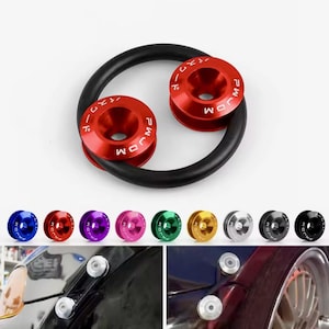 May include: Red and black automotive fasteners with the text "JDM" and Japanese characters. The image shows the fasteners in various colors, including blue, red, purple, pink, green, gold, silver, and black. The fasteners are shown installed on a car.