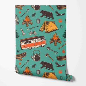 May include: Wallpaper with a teal background featuring a repeating pattern of camping and outdoor adventure elements. Includes illustrations of a bear, tent, campfire, canoe, and a vintage camper van. The design is in a vintage, hand-drawn style.