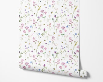 May include: A white background with a repeating pattern of watercolor wildflowers and bees. The flowers are pink, purple, blue, and white. The bees are yellow and black.