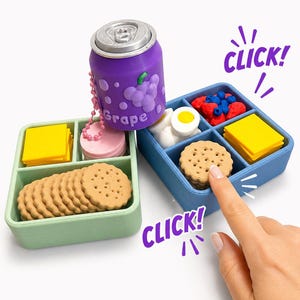 May include: A miniature lunch set with a purple grape soda can, a green lunchbox with crackers and cheese, and a blue lunchbox with a cookie, cheese, egg, and berries. The word "CLICK!" is written on the image.