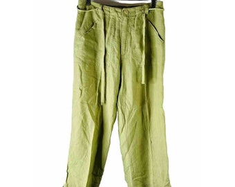 May include: Green linen pants with a tie waist and pockets.