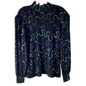 May include: Black sweater with a high ruffled collar and long sleeves. The sweater is adorned with a wavy sequin pattern in shades of teal and purple. The sleeves have a slight puff at the shoulders and are fitted at the wrists.