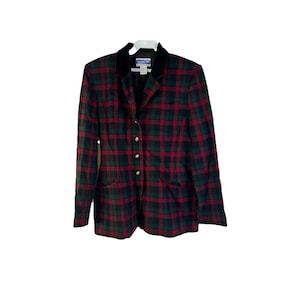 May include: A plaid blazer in red, green, and black. The blazer has a black velvet collar, gold buttons, and two front pockets. The tag reads "Pendleton".