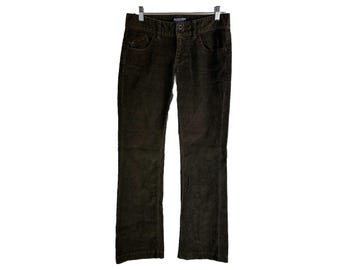 May include: Dark brown corduroy pants with a straight leg fit.