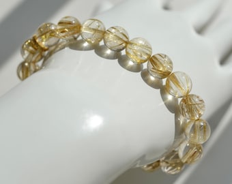 9.5~10mm round beaded high quality natural Golden rutilated quartz bracelet (length:19cm)[S0025]