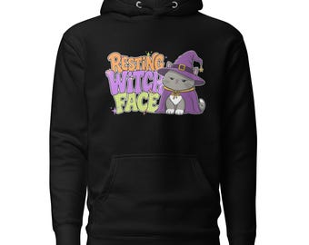 Sudadera unisex con capucha de Halloween con estampado de gato y cara de bruja en reposo para Halloween.