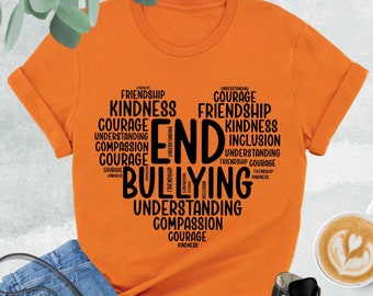 May include: Orange t-shirt with a black word cloud design that says "End Bullying". The word cloud includes words like "friendship", "kindness", "courage", "understanding", and "compassion".