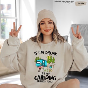 a woman wearing a sweatshirt that says if i'm drunk it's my