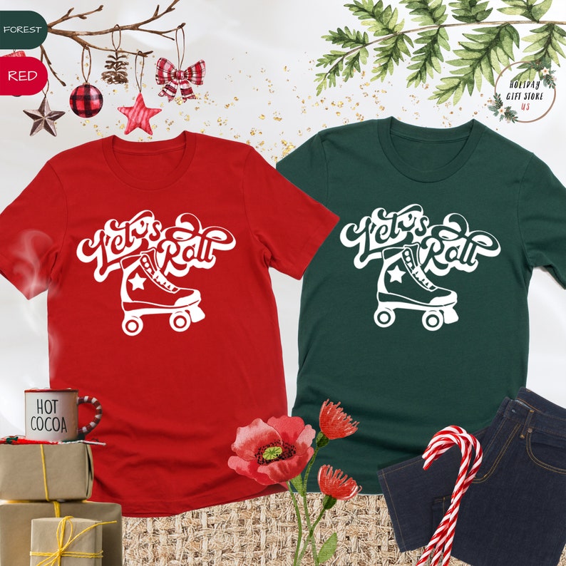 May include: Two t-shirts with a white graphic of a roller skate and the text "Let's Roll". One t-shirt is red and the other is green.
