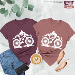 a couple of shirts that are on a table