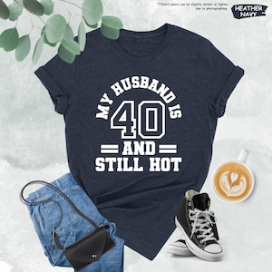a t - shirt that says, my husband is 40 and still hot