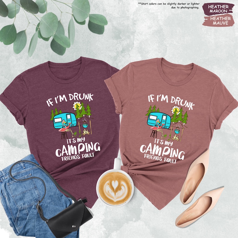 a couple of shirts that are next to a cup of coffee