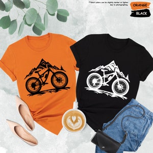 a couple of shirts that are on a table