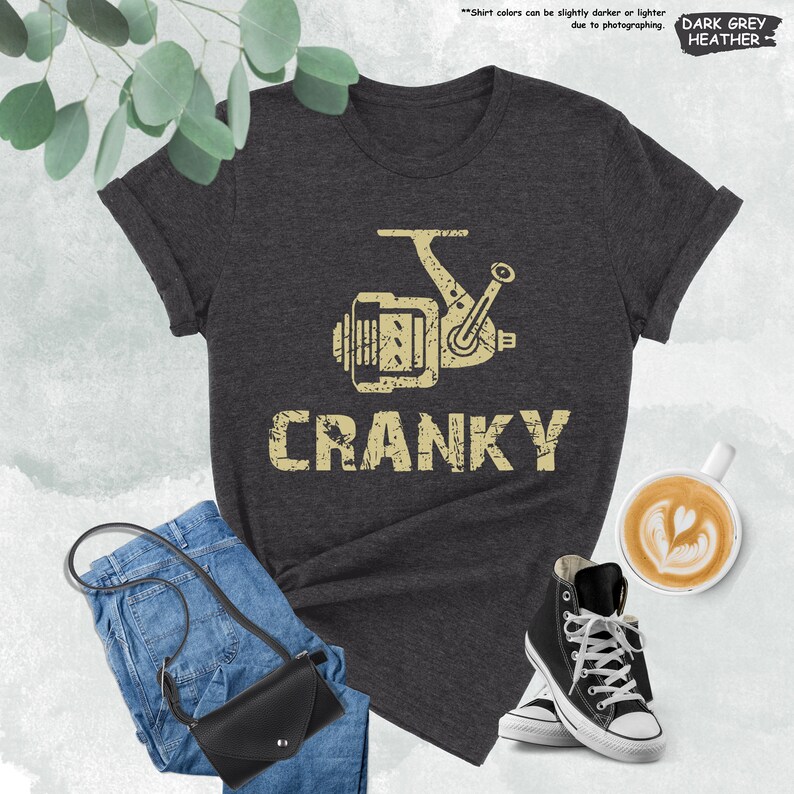 a t - shirt that says cranky next to a pair of sneakers