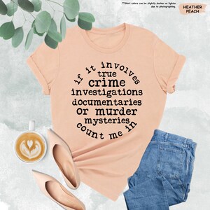 a t - shirt that says, i'm in the crime investigates documents or