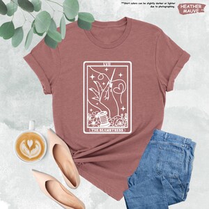 a t - shirt with a tarot card design on it