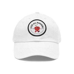 May include: White baseball cap with a curved brim. The cap features a circular patch with the text "FOR ALL RUNNERS" around a cartoon cherry character. The cherry is red with a green stem and smiling face. The patch also includes the year "2025".