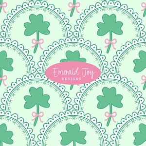 May include: A repeating pattern featuring green shamrocks with pink bows, set against a light green background. Each shamrock is framed by a white scalloped border with small bows. The text "Emerald Joy DESIGNS" is in a pink oval.