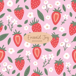 May include: A pink seamless pattern with red strawberries, white flowers, and green leaves. Some strawberries are halved, showing the inside. The text "Emerald Joy Designs" is in a tan oval.