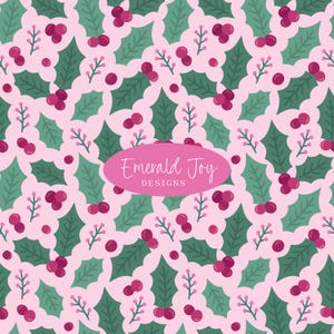 May include: A repeating pattern featuring green holly leaves and red berries on a light pink background. The design includes small sprigs and is overlaid with a pink oval containing the text "Emerald Joy DESIGNS".