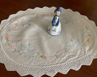 Large vintage hand embroidered table centre doily of bluebirds and daisy chains. Lovely embroidery on white linen. Deep hand crochet edge.