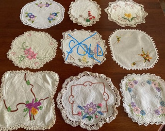 Vintage linen hand embroidered floral small doily with crochet lace edging. 9 to choose from.