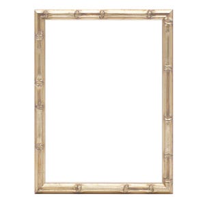 May include: A rectangular gold-colored picture frame with a bamboo-style design. The frame has a light, neutral tone and a textured surface, with vertical and horizontal lines creating a bamboo effect. The frame is empty, with a white background.