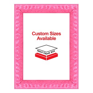 May include: A bright pink picture frame with ornate detailing. The frame has a rectangular shape and features the text "Custom Sizes Available" and a logo for Print Frame Box.